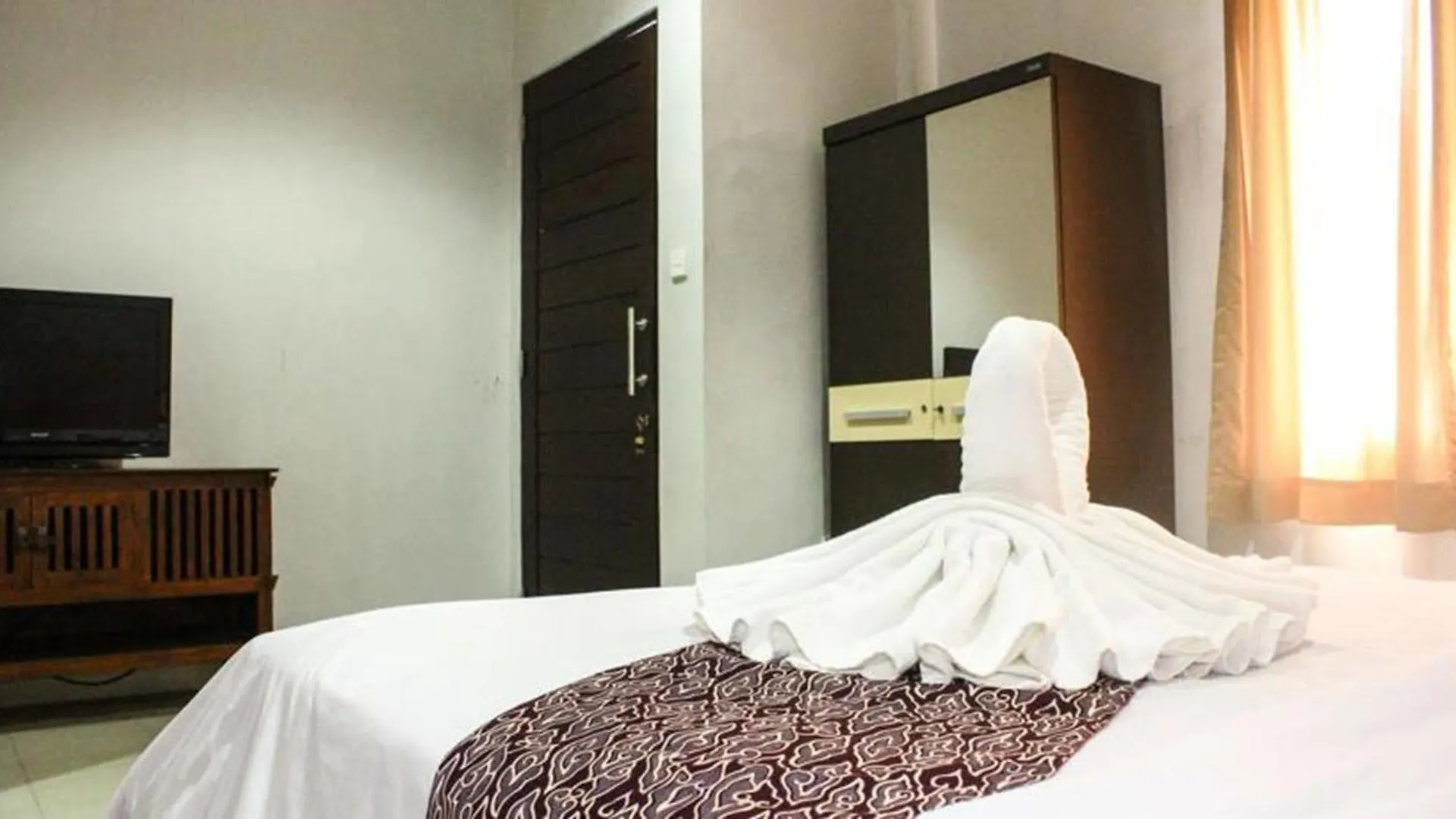 Kembang Sari Suites Apartment Kuta